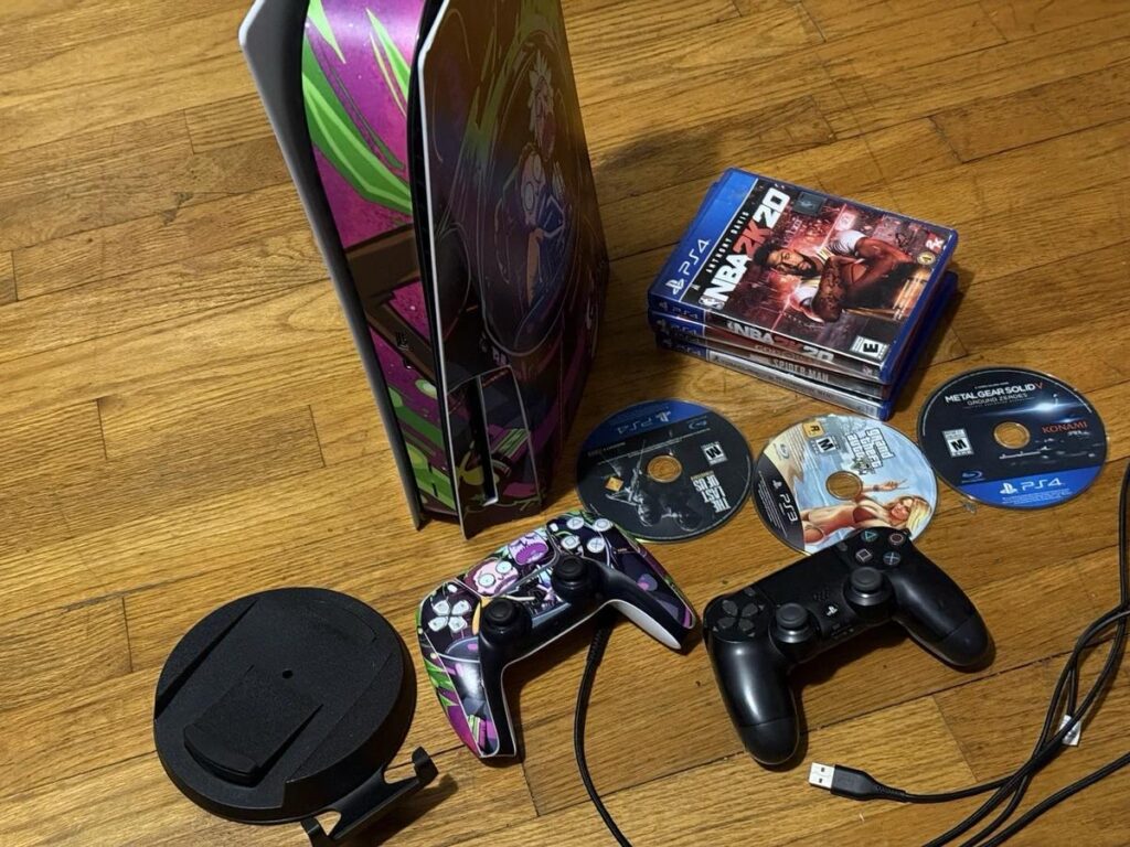 PlayStation physical games collection showing game discs and cases
